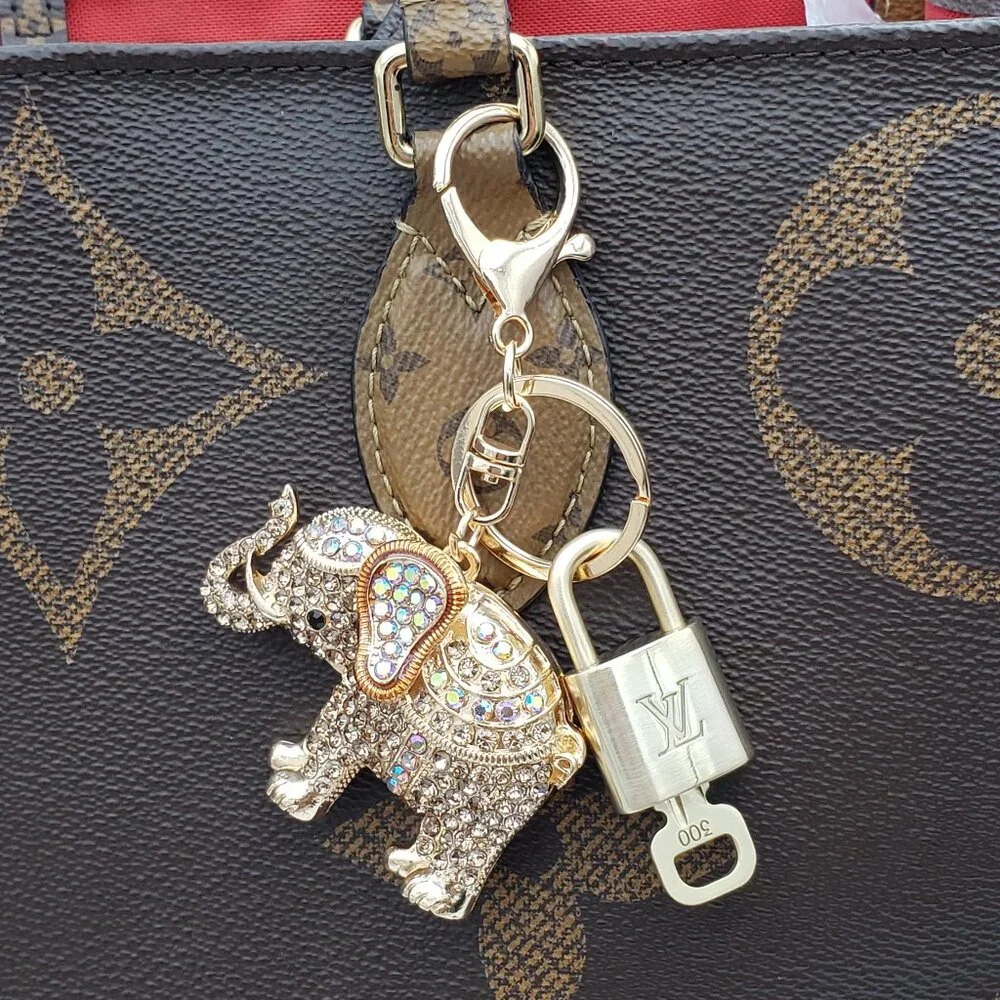 Authentic Louis Vuitton Lock & Key with Unbranded Elephant Charm, Keychain